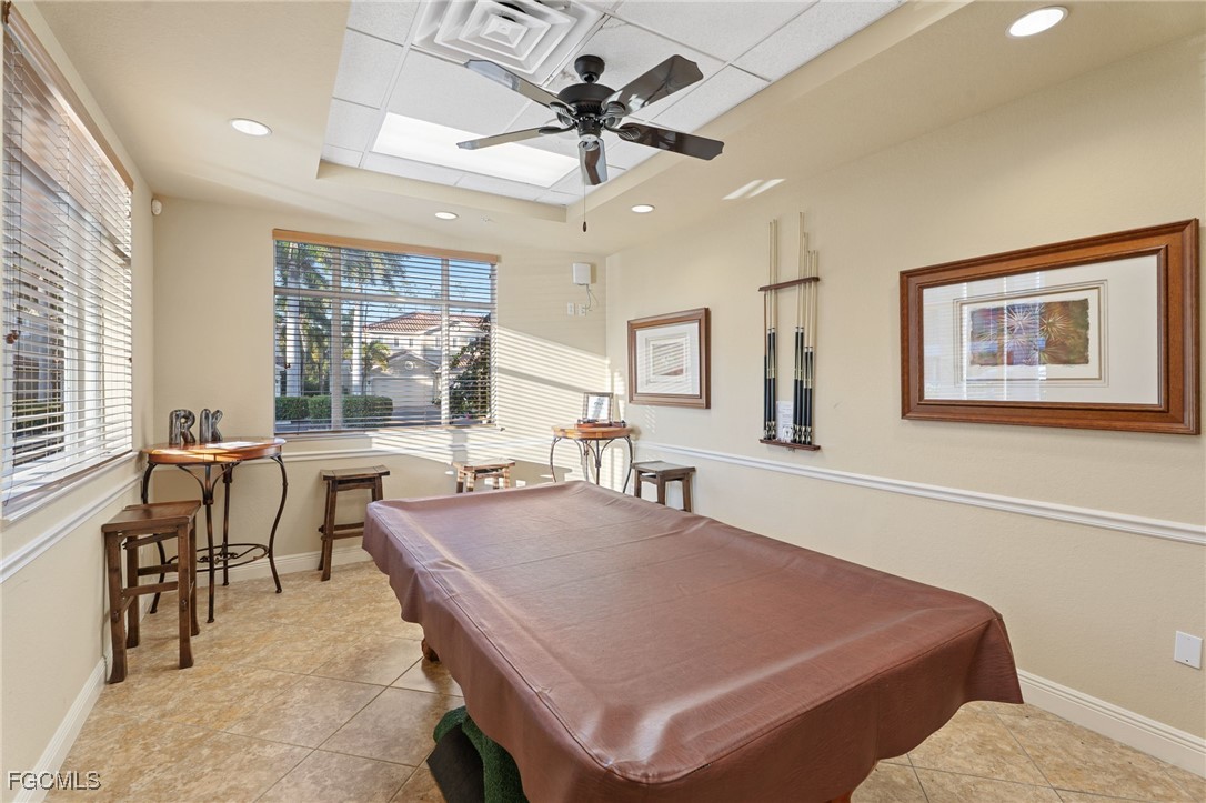 14981 Reflection Key Circle, Unit 335 Fort Myers, FL 33907 - Photo 36 of 42 a view of a dining room with furniture