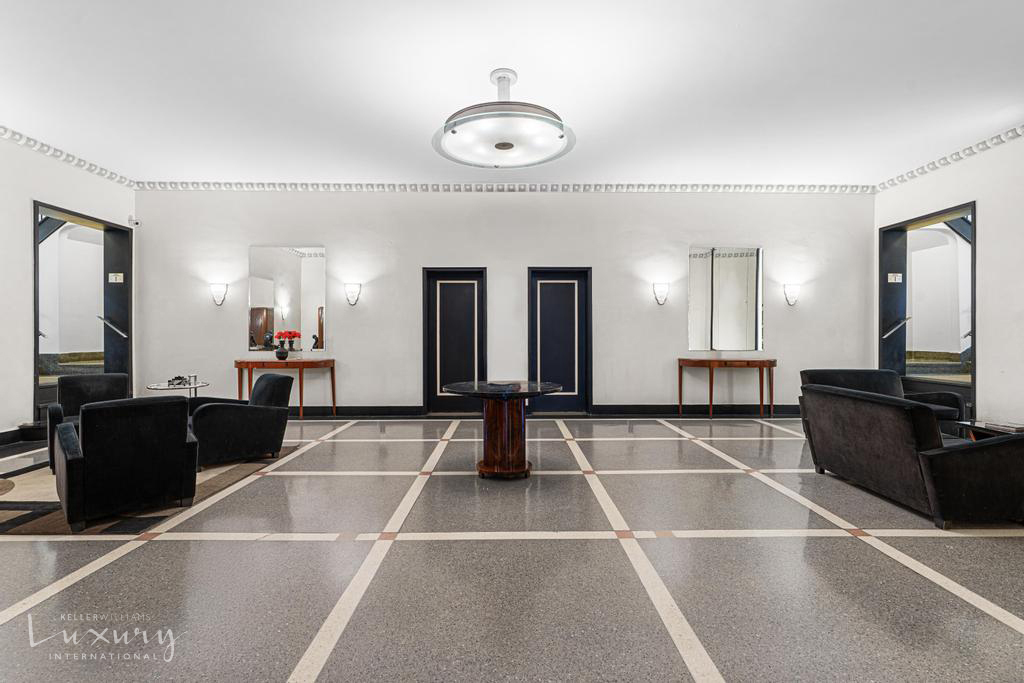 Undisclosed Address Manhattan, NY 10021 - Photo 12 of 15 a room with gym equipment and a glass door