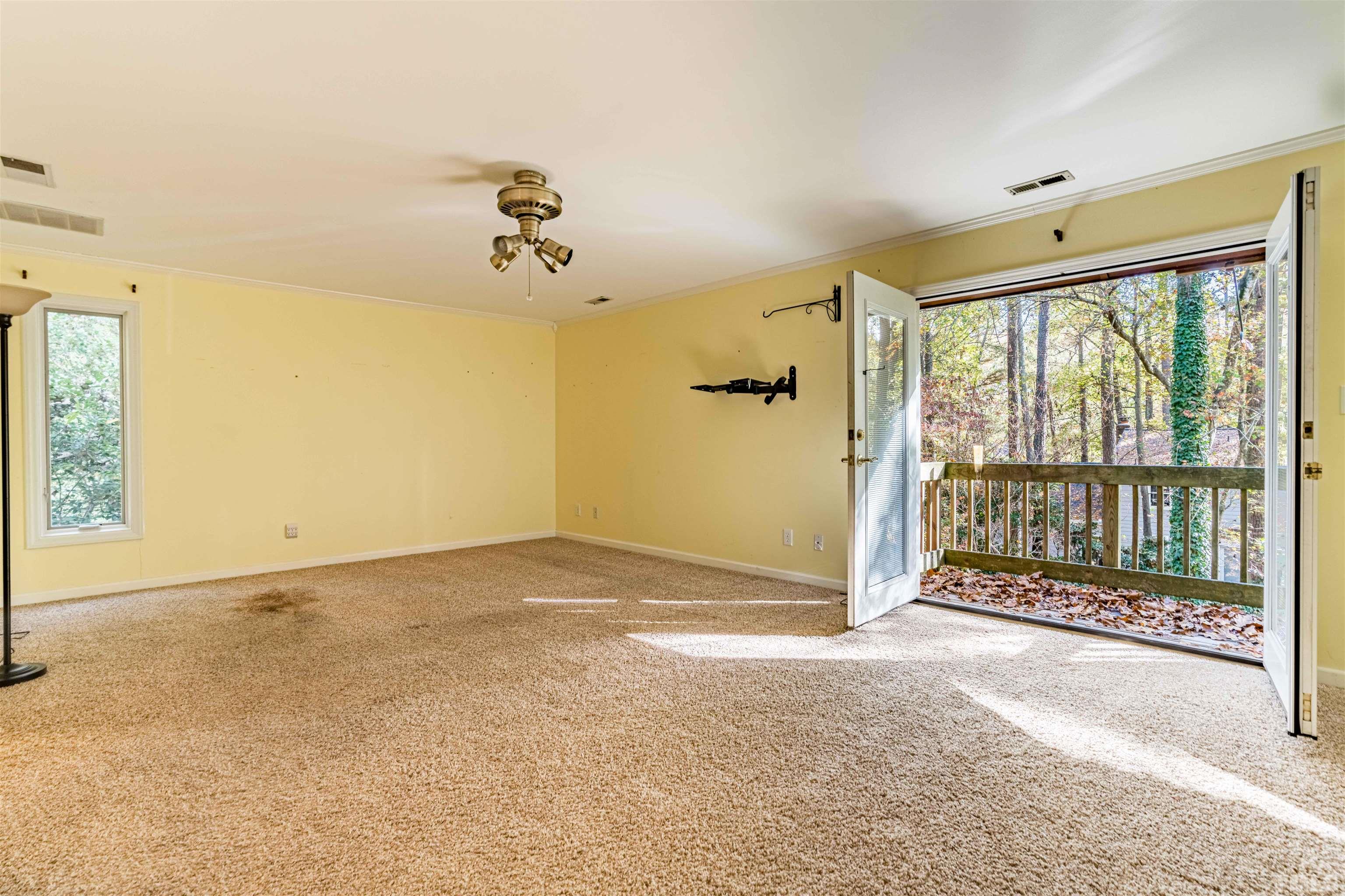 3105 Rutledge Court Raleigh, NC 27613 - Photo 29 of 48 a view of an empty room with a window