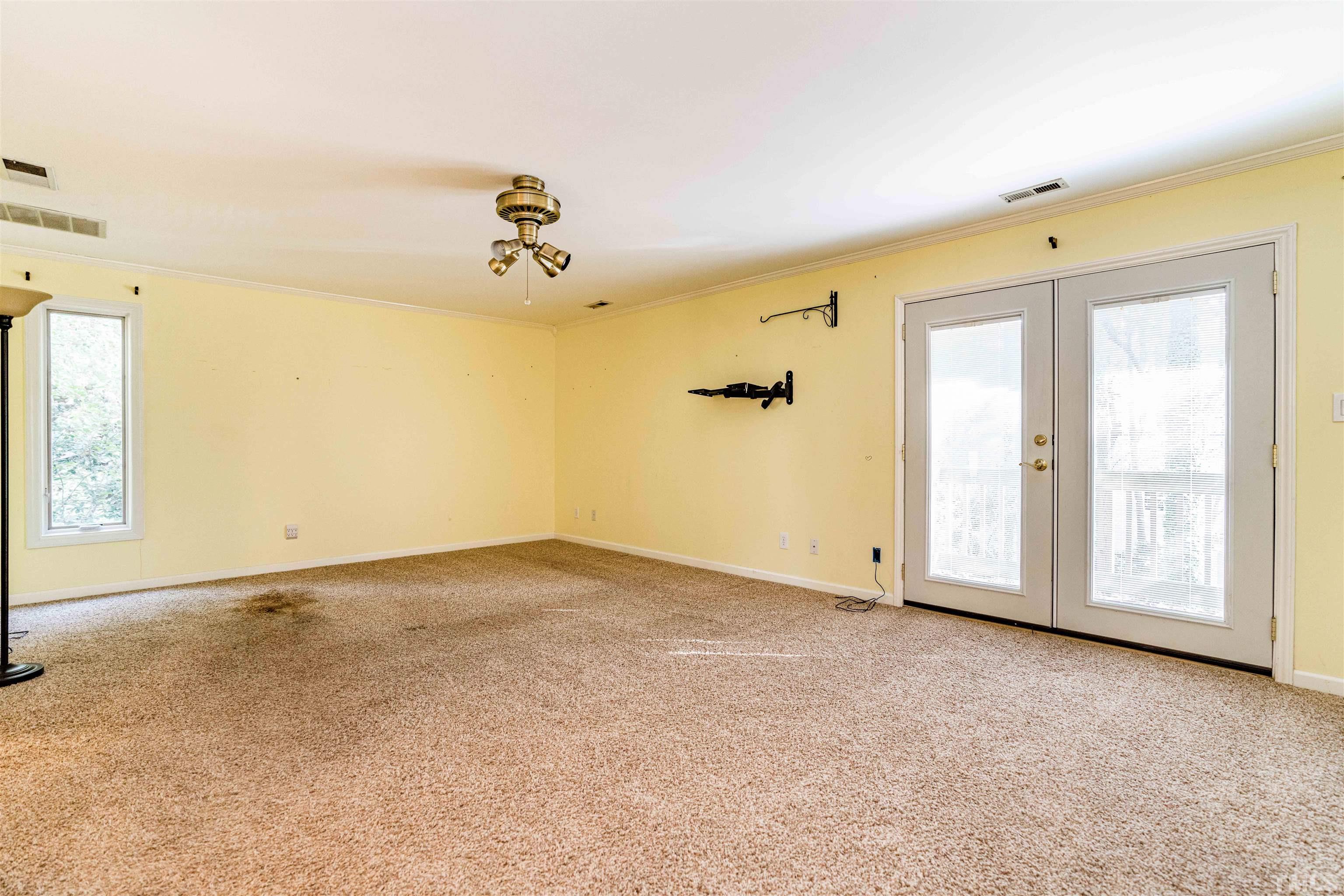 3105 Rutledge Court Raleigh, NC 27613 - Photo 31 of 48 an empty room with windows