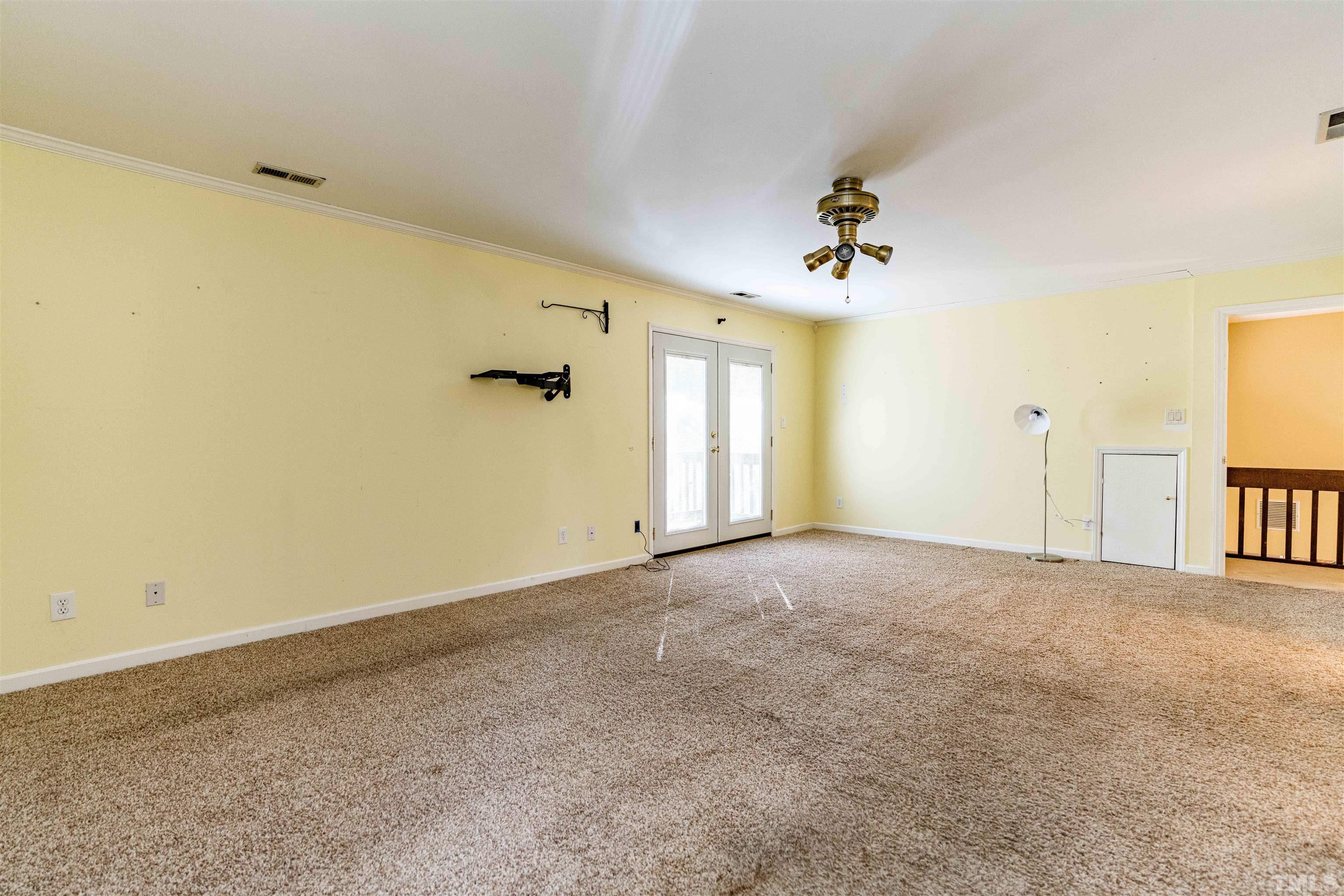 3105 Rutledge Court Raleigh, NC 27613 - Photo 32 of 48 a view of an empty room with a window