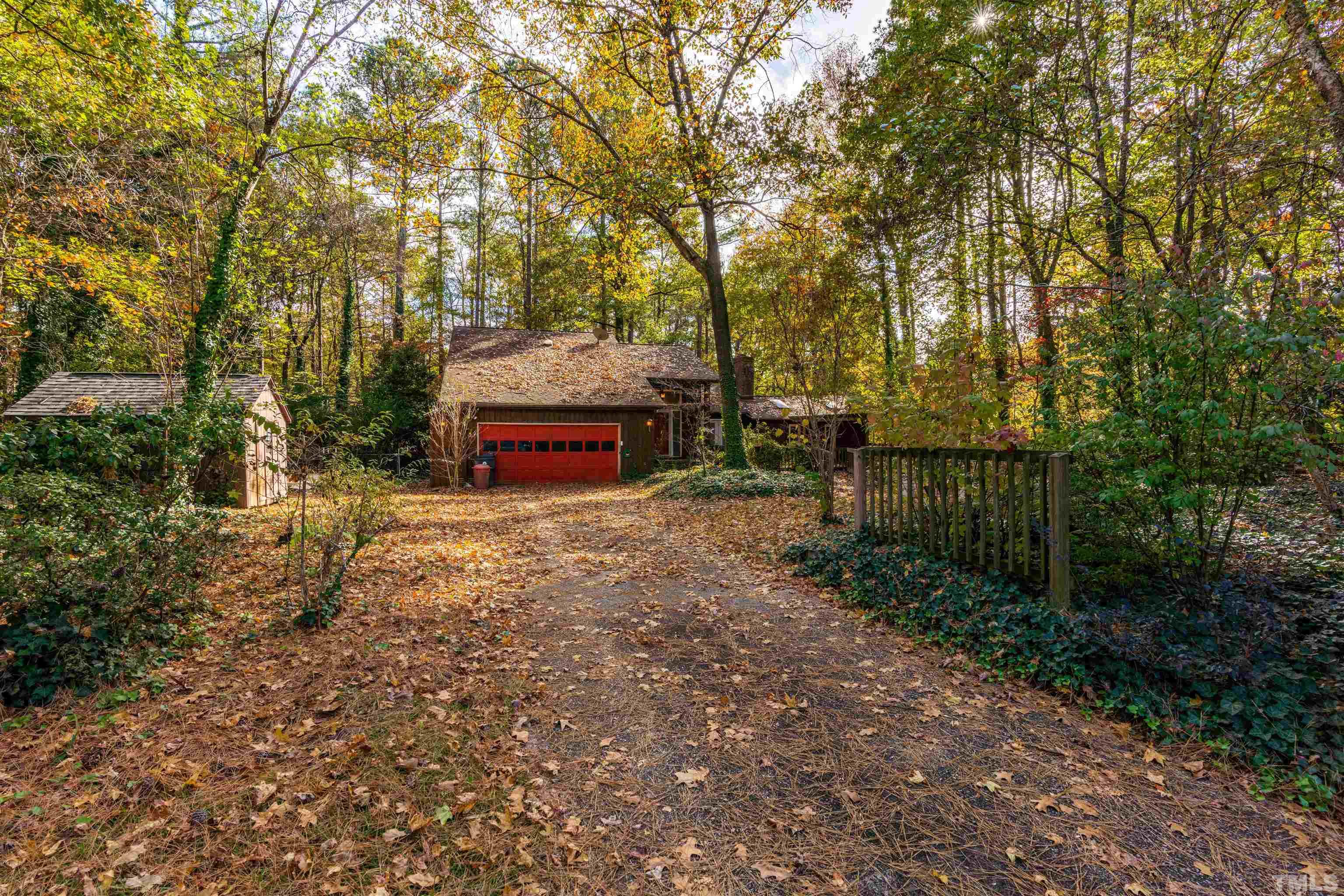 3105 Rutledge Court Raleigh, NC 27613 - Photo 47 of 48 a pathway of a house with a yard