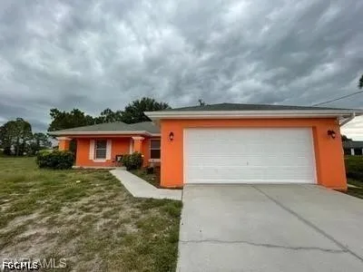 a front view of house with yard