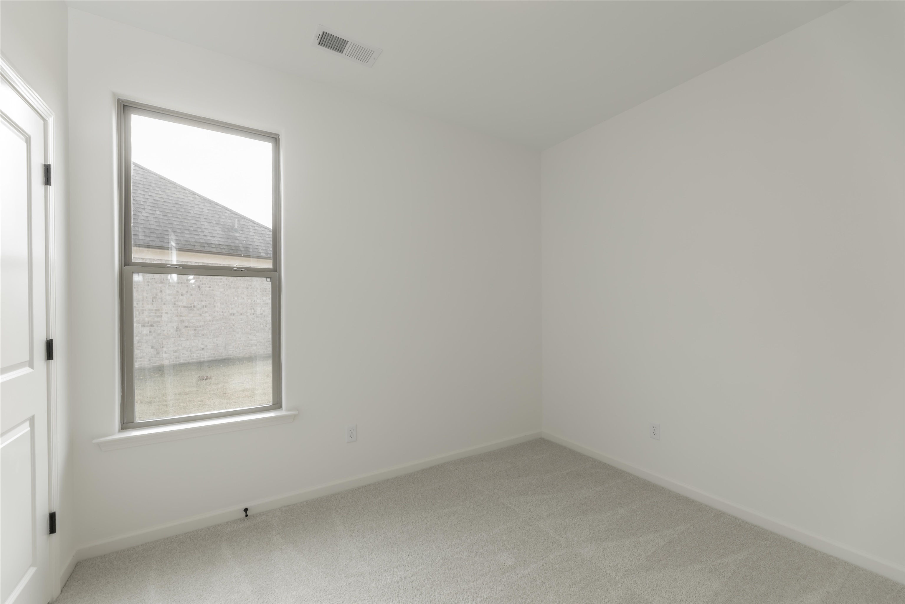 22 Doral Loop Oakland, TN 38060 - Photo 17 of 27 an empty room with a window