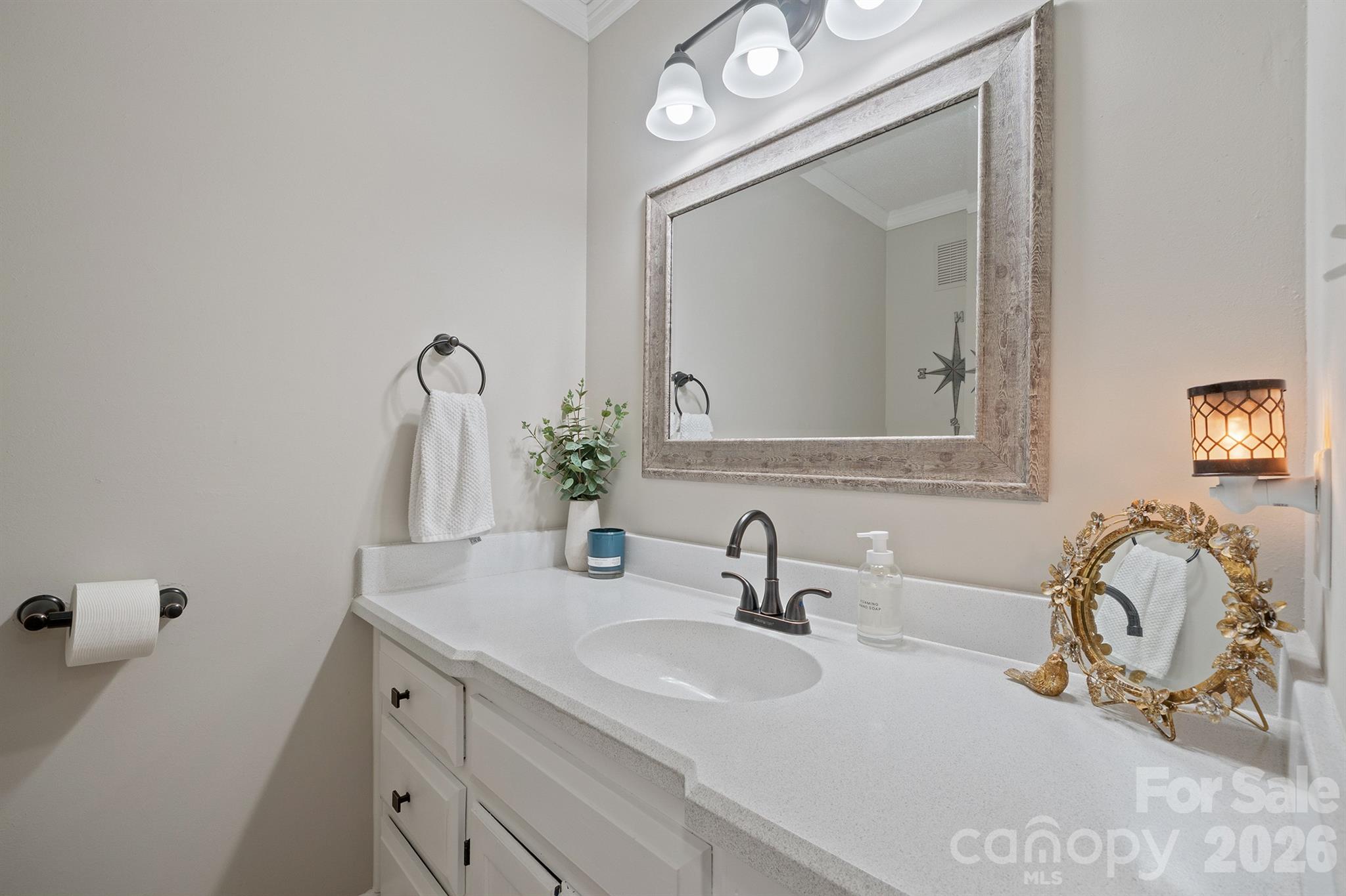 19017 Kailua Circle Tega Cay, SC 29708 - Photo 21 of 46 a bathroom with a double vanity sink and a mirror
