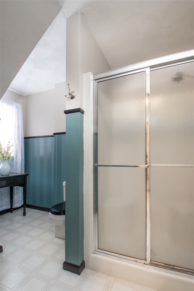 6526 North Marrill Road Byron, IL 61010 - Photo 17 of 25 a bathroom with a glass shower door