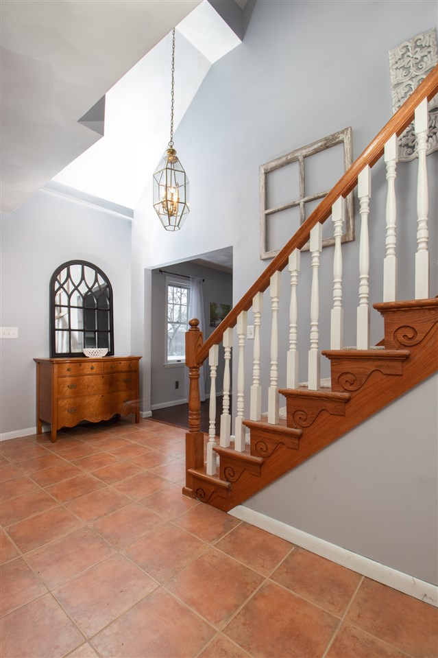 6526 North Marrill Road Byron, IL 61010 - Photo 4 of 25 a view of entryway and hall with wooden floor