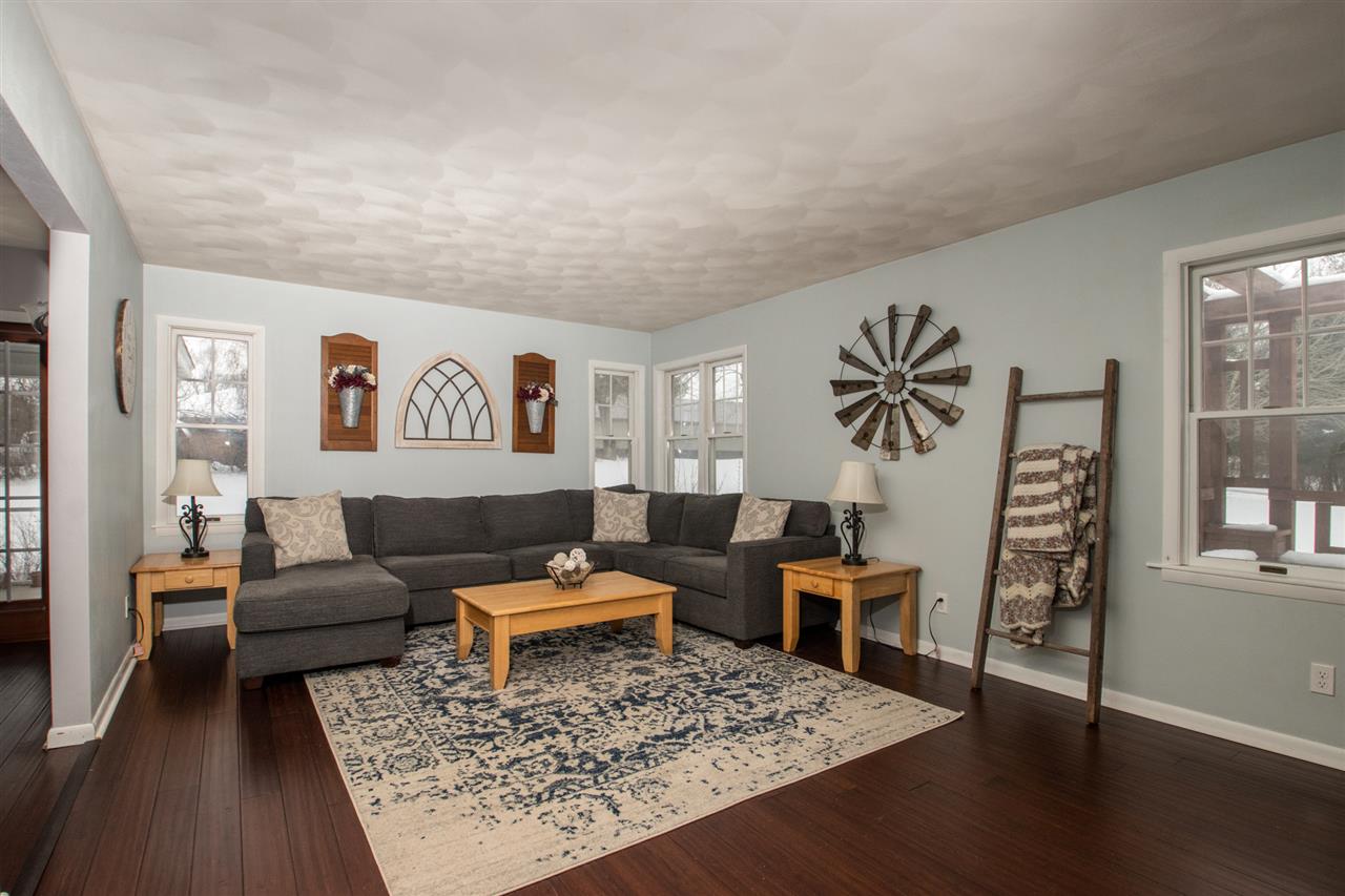 6526 North Marrill Road Byron, IL 61010 - Photo 8 of 25 a living room with furniture and wooden floor