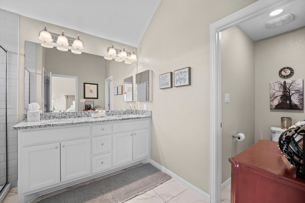 529 Cold Riv Run Kyle, TX 78640 - Photo 22 of 39 The primary bath offers shared use and privacy, when needed. Also, comes equipped with a convenient medicine cabinet.