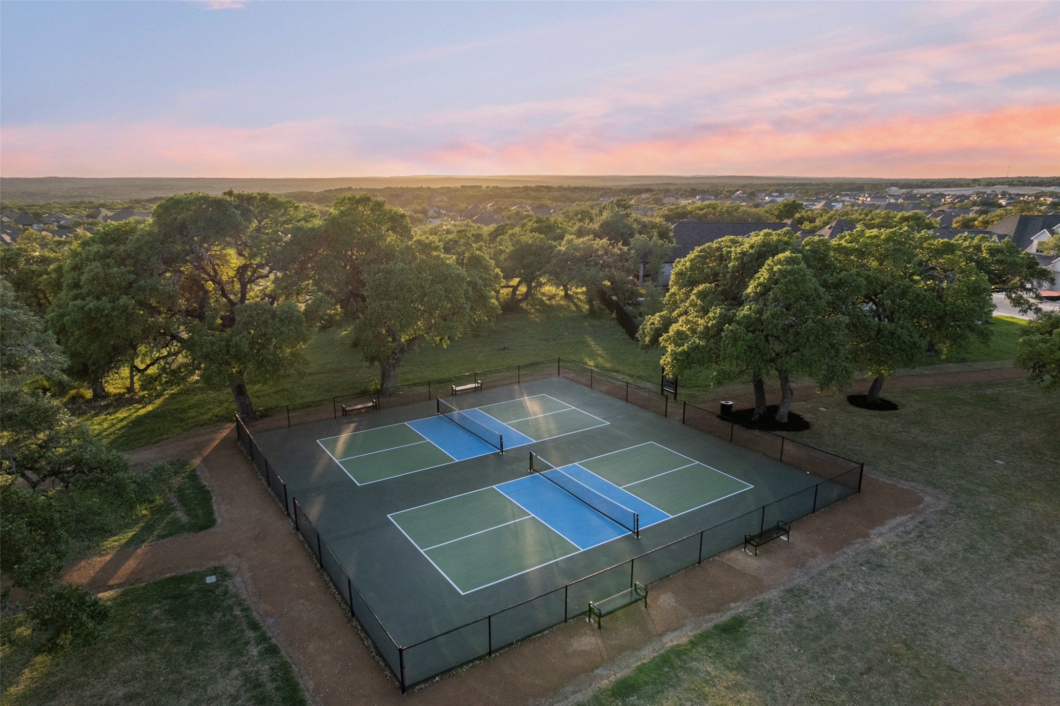 529 Cold Riv Run Kyle, TX 78640 - Photo 37 of 39 Enjoy some time competing with friends on the tennis courts or pickleball courts!