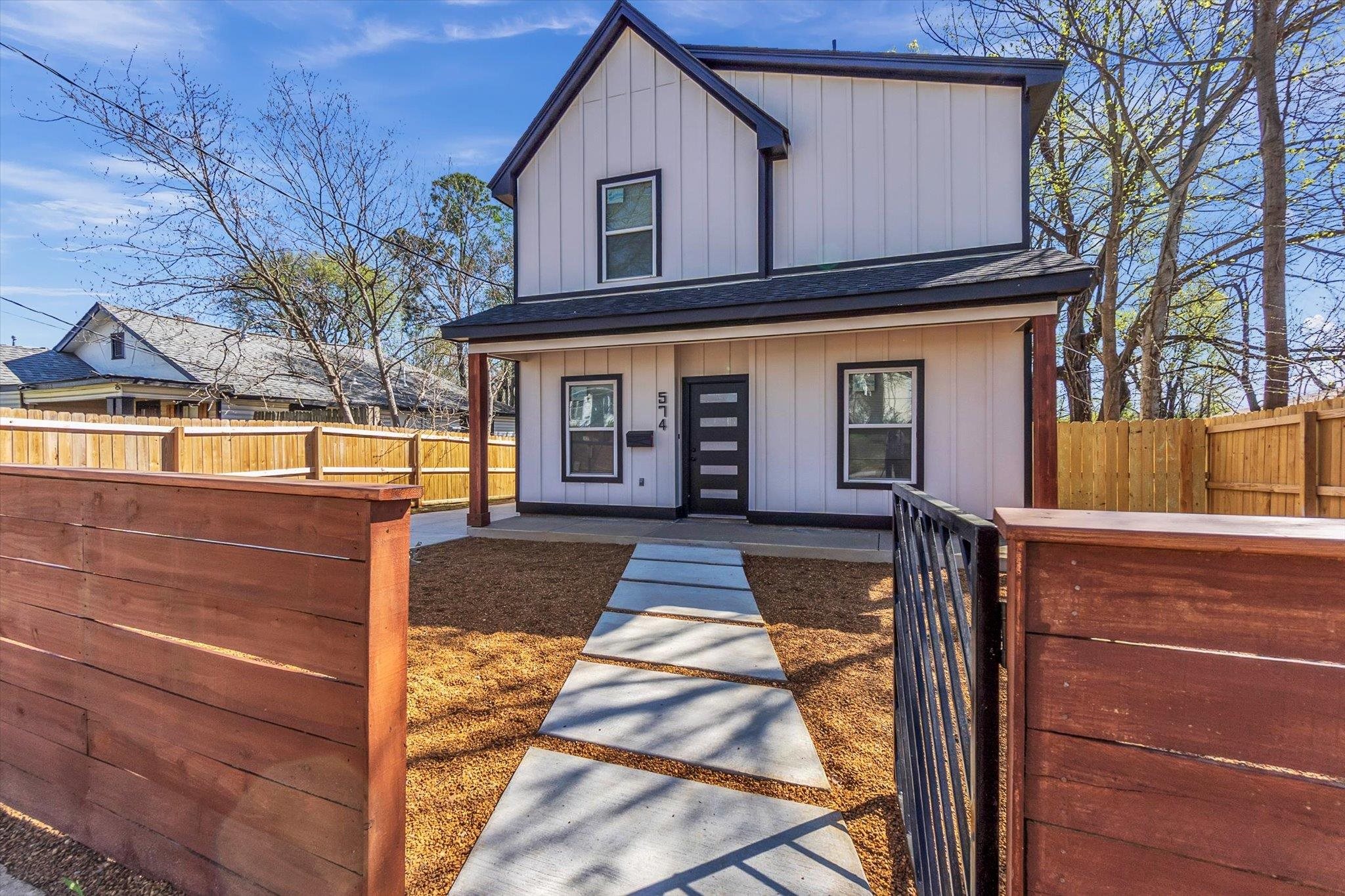 574 Lipford Street Memphis, TN 38112 - Photo 2 of 26 a front view of a house with a yard
