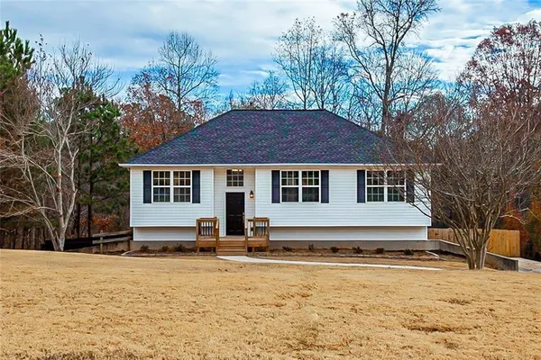 a view of a house with snow on the side of the house