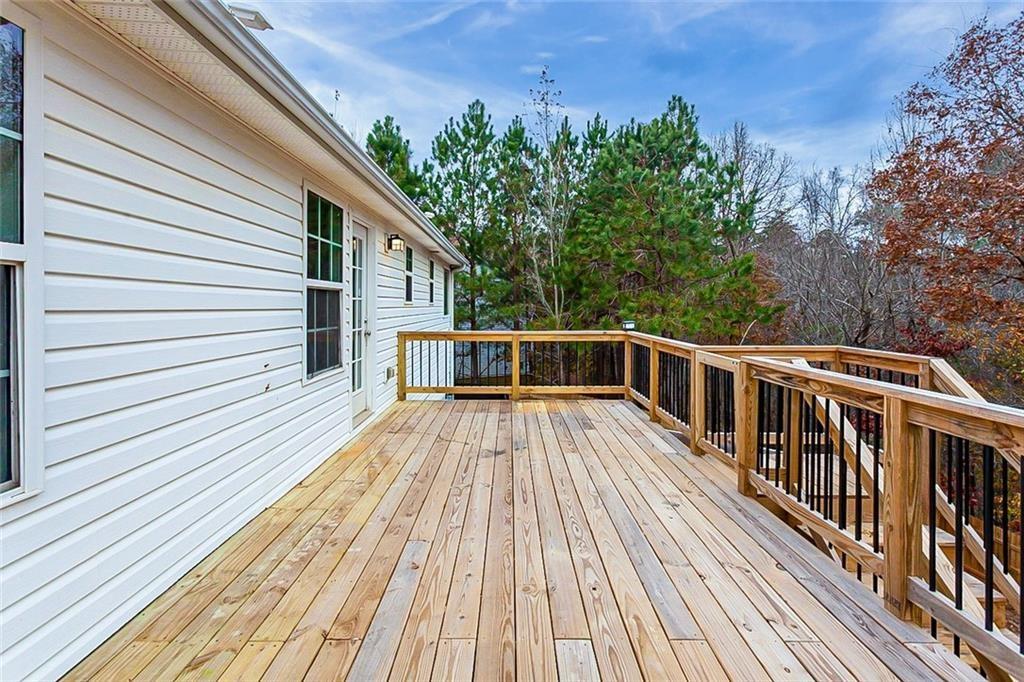 427 Southridge Road Winder, GA 30680 - Photo 23 of 31 a view of wooden deck with a patio
