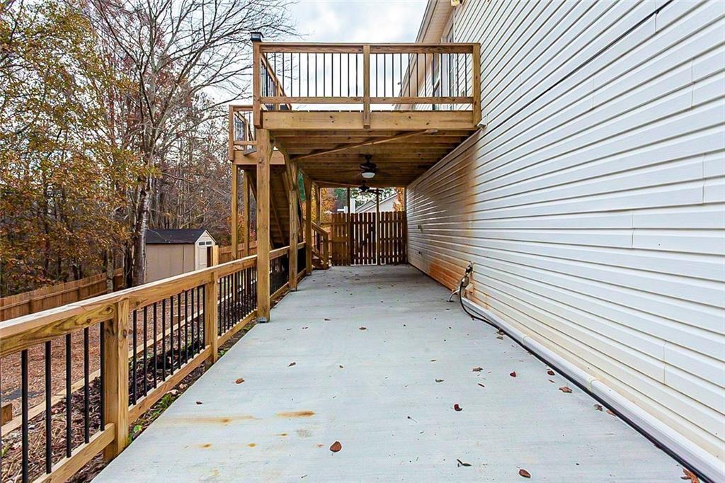 427 Southridge Road Winder, GA 30680 - Photo 25 of 31 a view of a porch with wooden floor