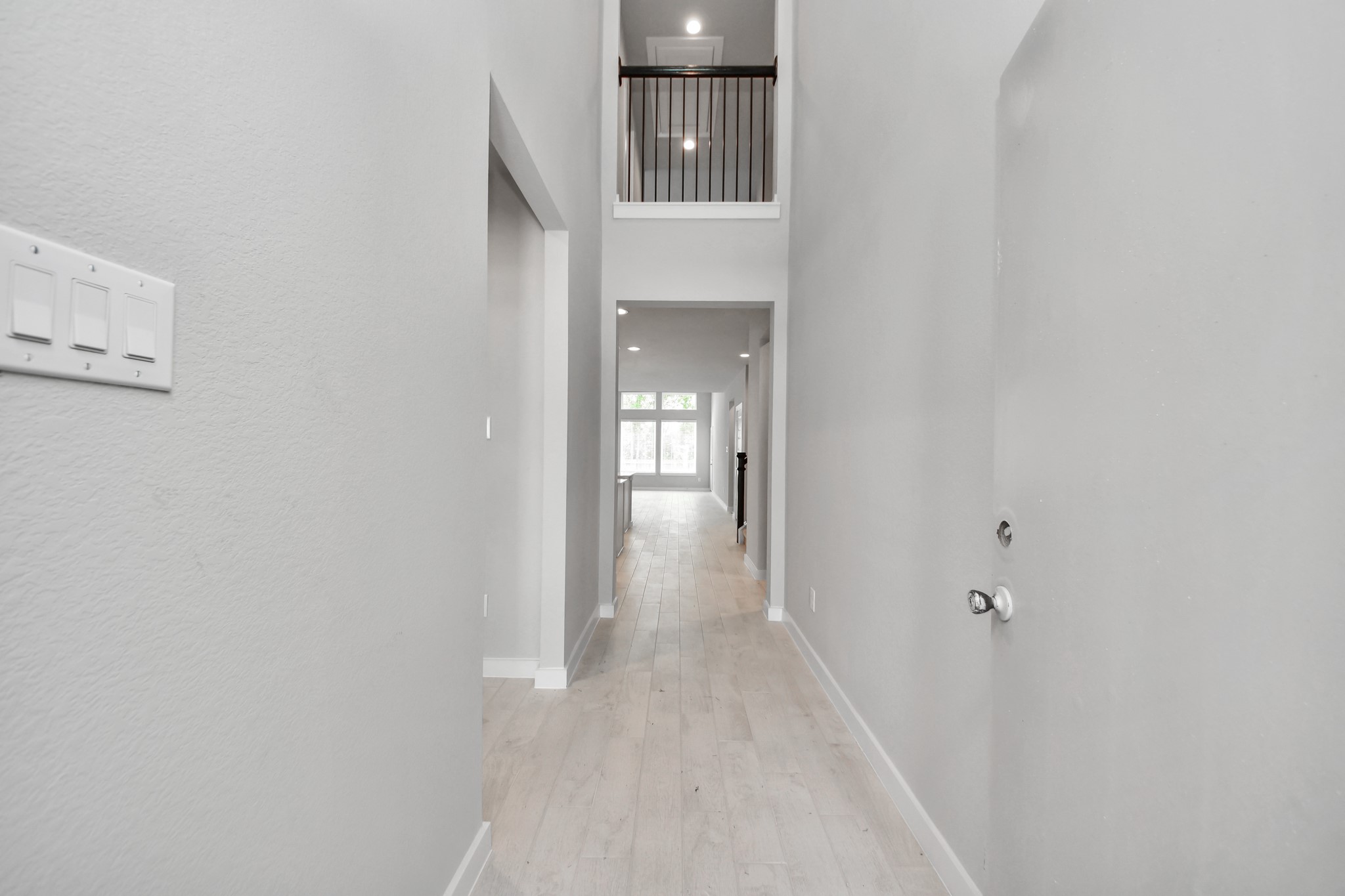2946 Burris Park Drive Spring, TX 77373 - Photo 7 of 45 As you step into the threshold of this luxurious home, you'll soon be welcomed by an elegant glass door (to be installed). Inside, soaring ceilings amplify the spaciousness, while the refined wood-look tile flooring and oversized baseboards exude sophistication and charm.