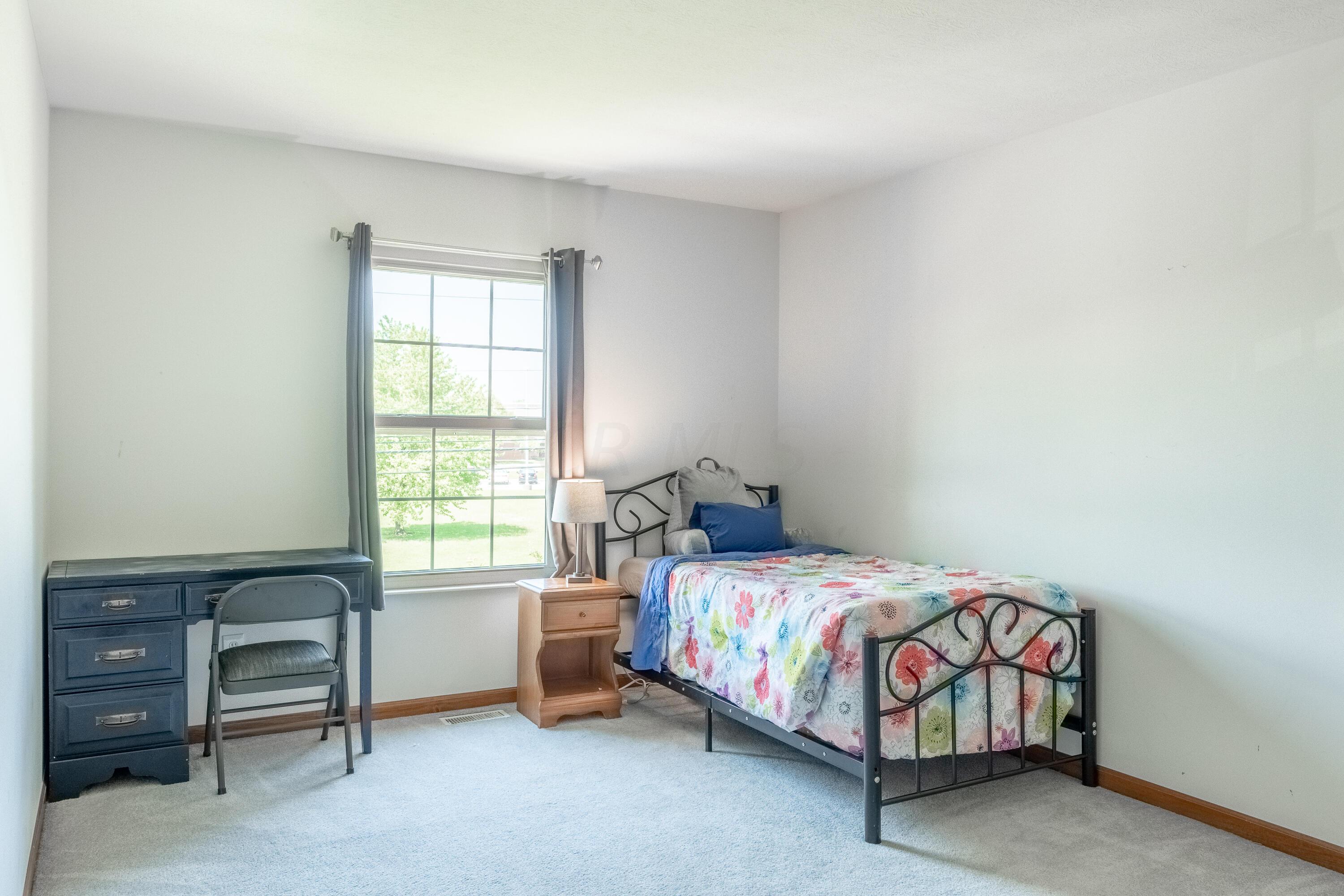 7168 Linworth Road Columbus, OH 43235 - Photo 23 of 34 Second floor bedroom 5 offers plenty of space for comfort