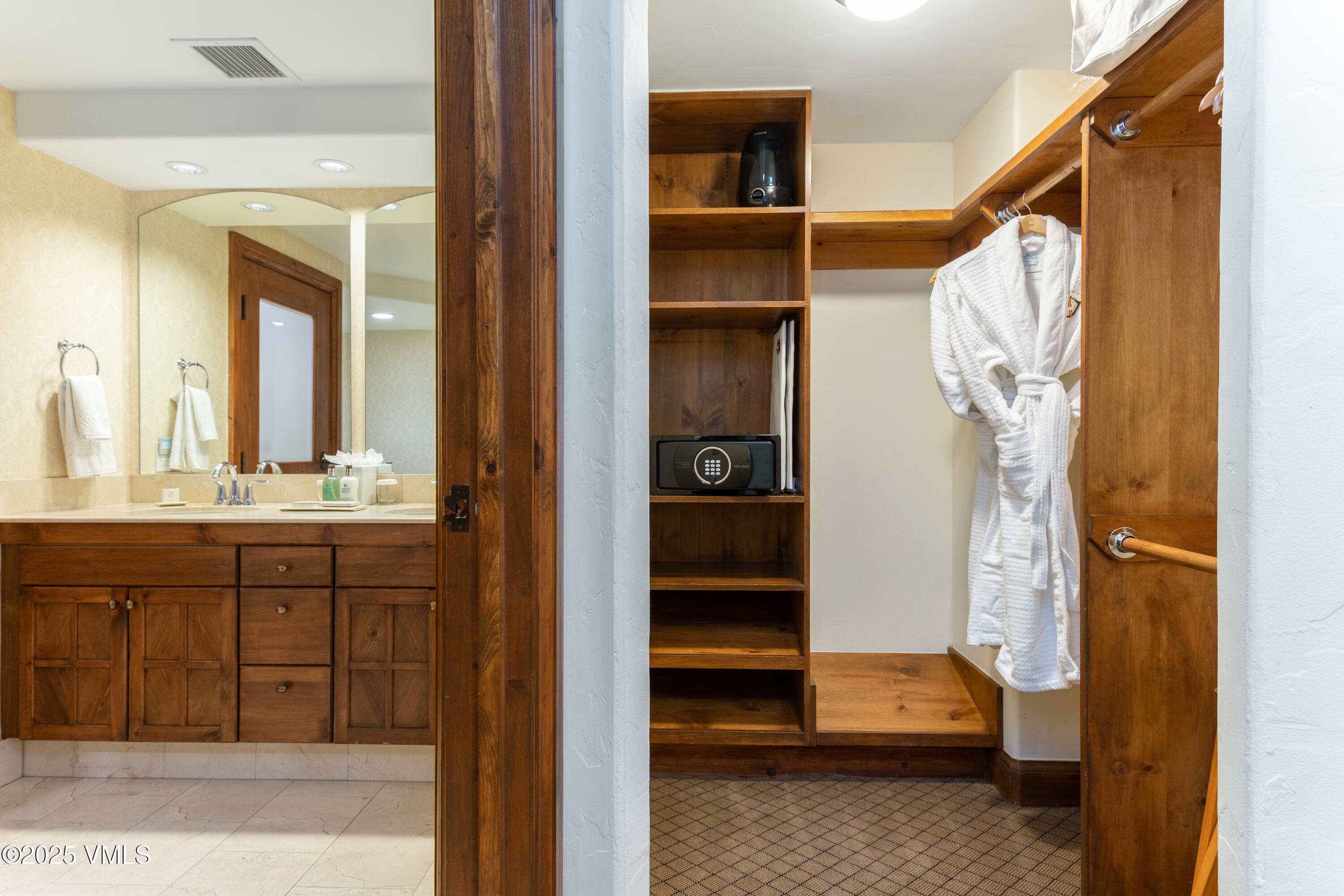 242 East Meadow Drive, Unit 3035 Vail, CO 81657 - Photo 18 of 28 a view of walk in closet and bedroom