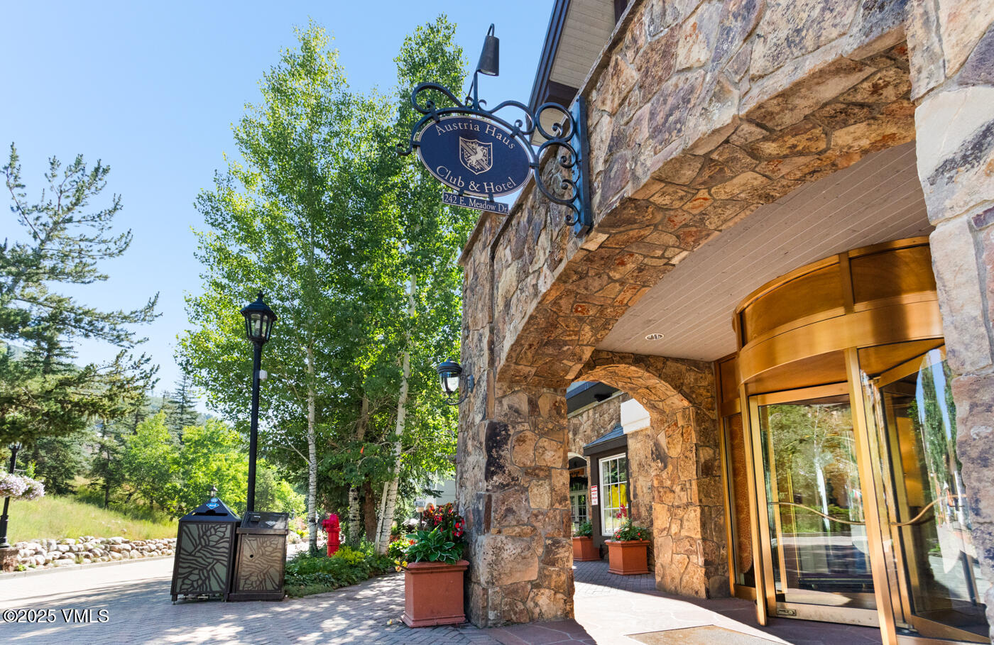 242 East Meadow Drive, Unit 3035 Vail, CO 81657 - Photo 25 of 28 a view of a building with a tree