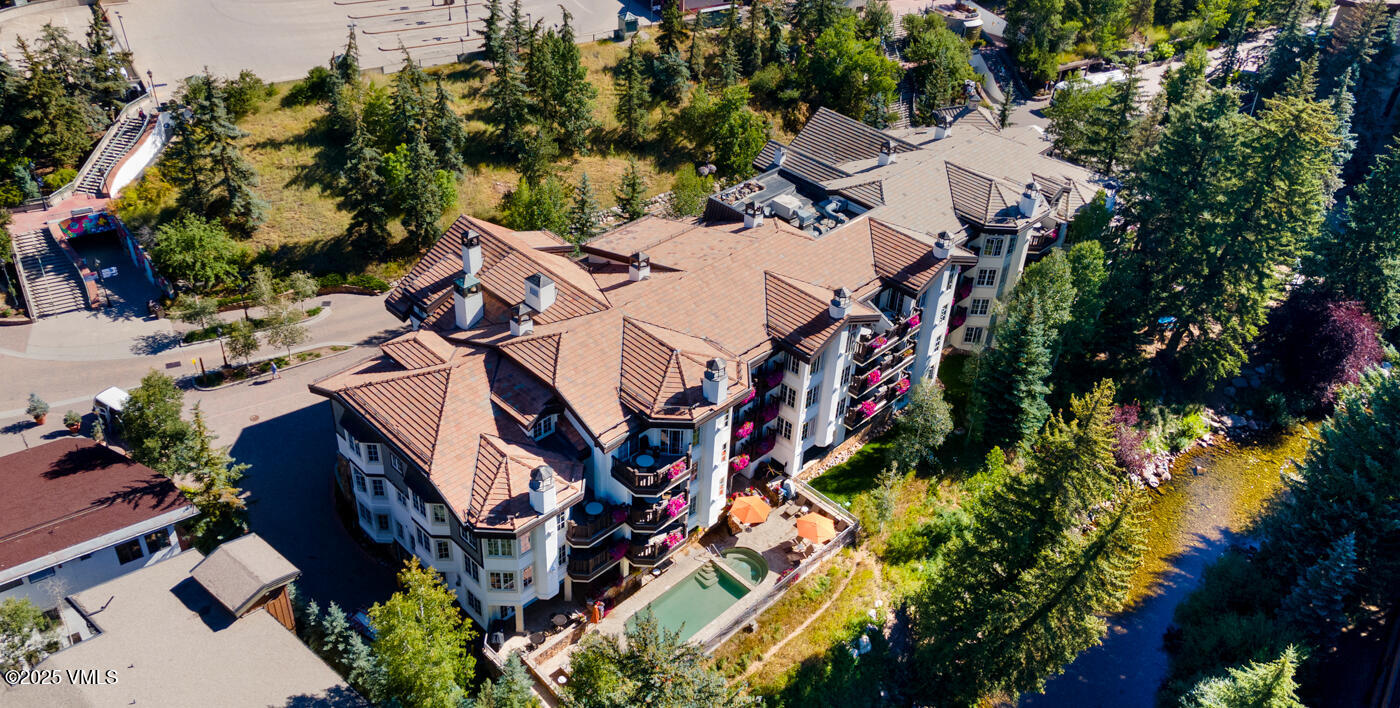 242 East Meadow Drive, Unit 3035 Vail, CO 81657 - Photo 28 of 28 an aerial view of a house with a yard and outdoor seating