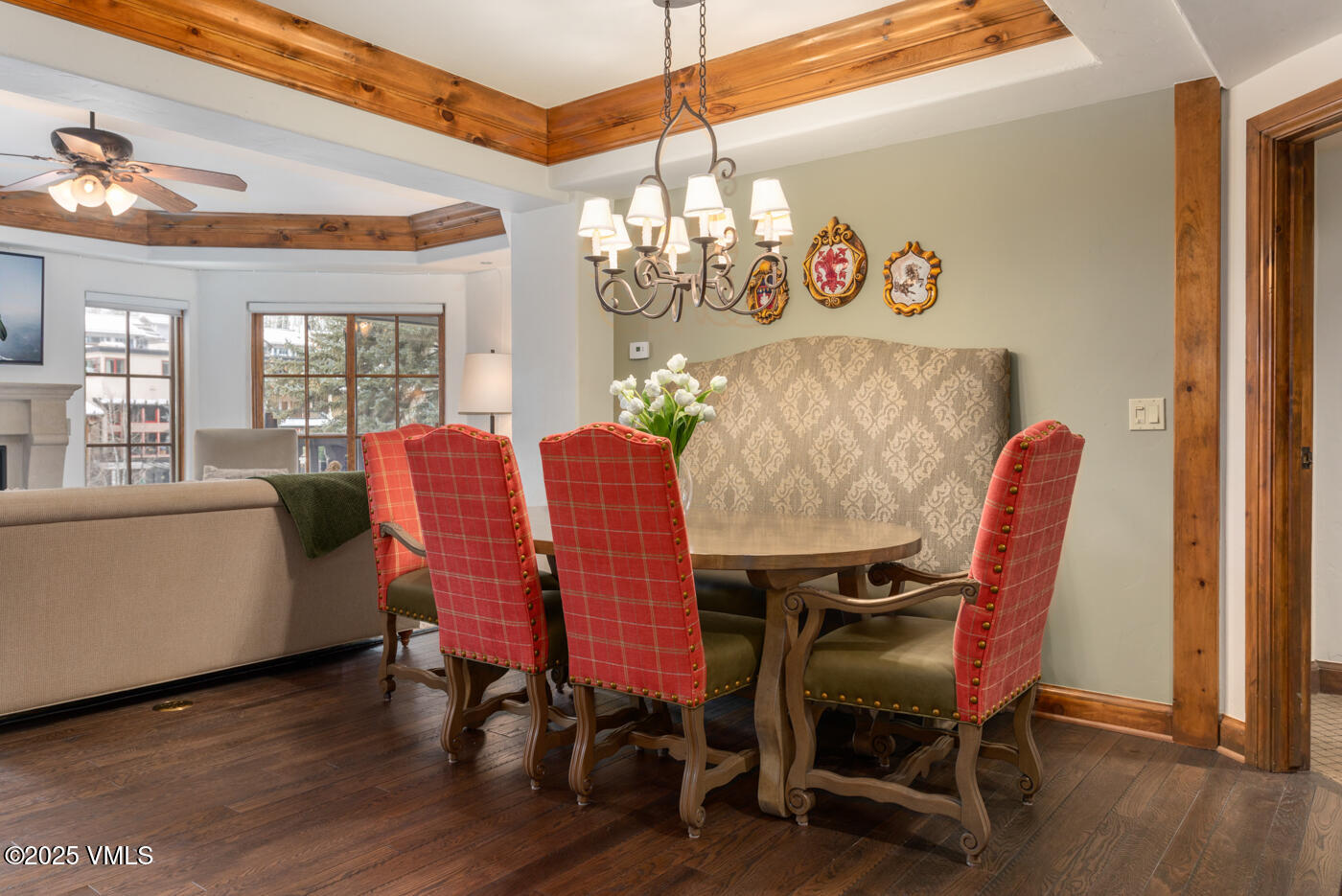 242 East Meadow Drive, Unit 3035 Vail, CO 81657 - Photo 6 of 28 a view of a dining room with furniture window and wooden floor