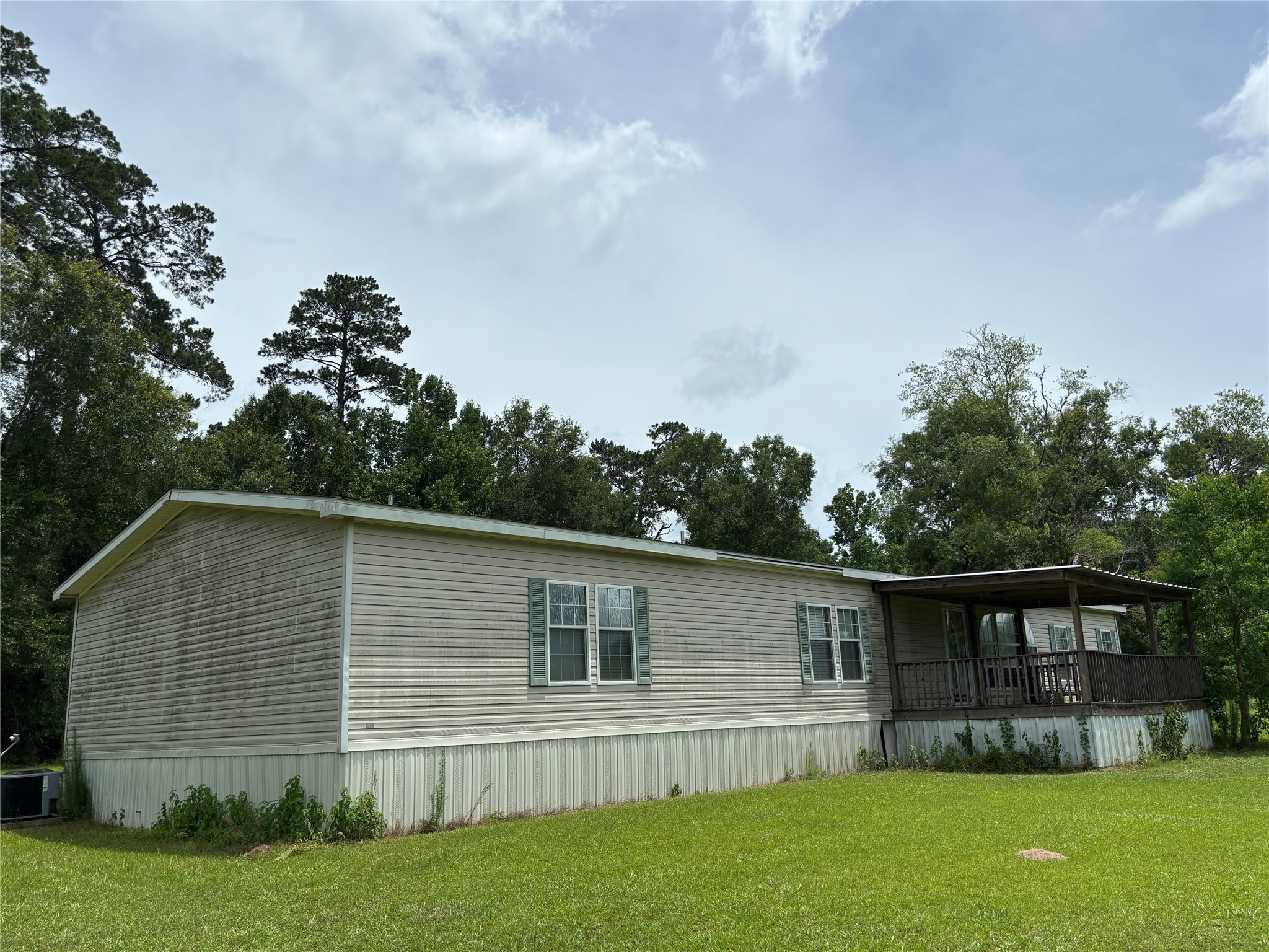 35599 State Highway South Buna, TX 77612 - Photo 10 of 40 a front view of house with yard and green space