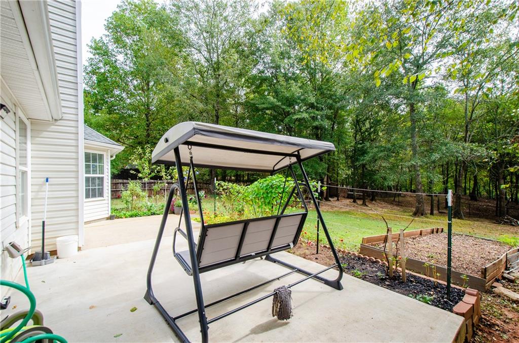 722 Moonlite Trace Winder, GA 30680 - Photo 31 of 41 a view of a swimming pool with a patio