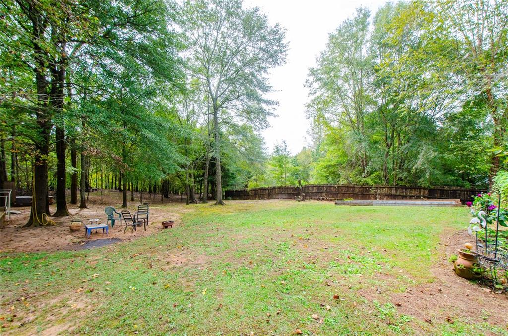 722 Moonlite Trace Winder, GA 30680 - Photo 33 of 41 a backyard of a house with table and chairs