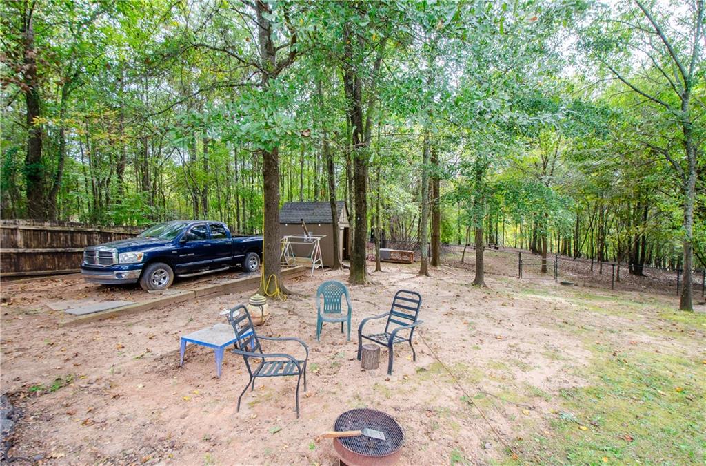 722 Moonlite Trace Winder, GA 30680 - Photo 35 of 41 a view of backyard with seating area and green space