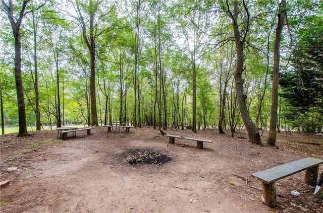 a view of outdoor space with deck and yard