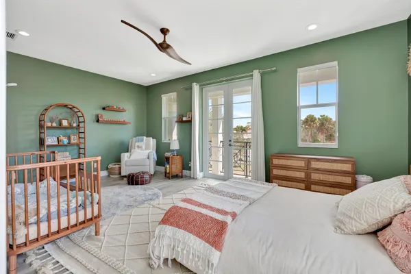 a bedroom with furniture and window