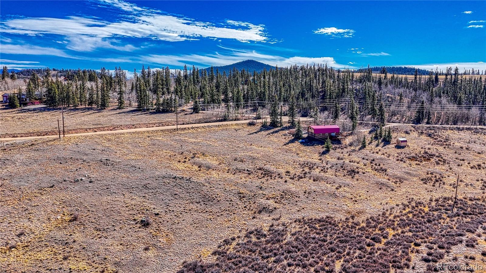 679 Apache Trail Como, CO 80456 - Photo 19 of 23 a view of a terrace with a bench