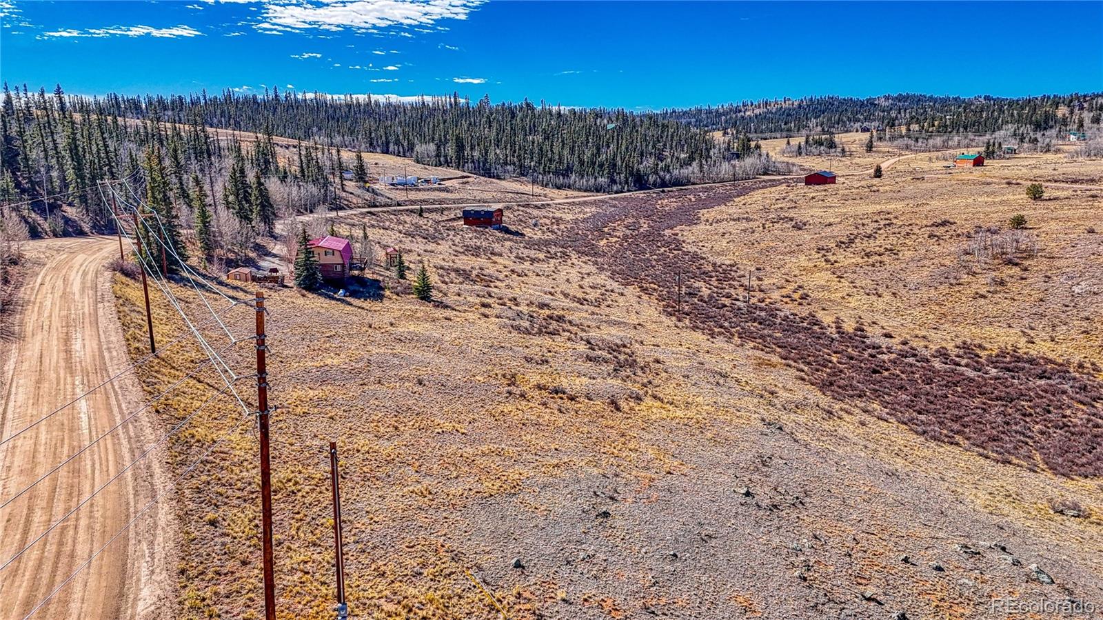679 Apache Trail Como, CO 80456 - Photo 4 of 23 a view of roof with wooden fence