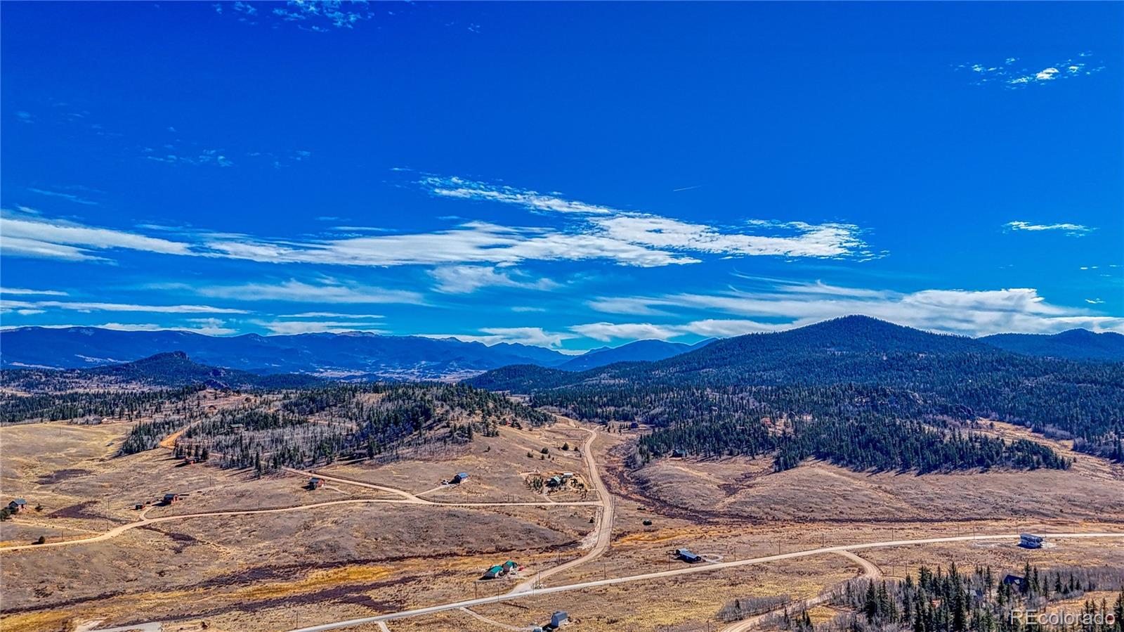 679 Apache Trail Como, CO 80456 - Photo 9 of 23 a view of a large body of water with mountain