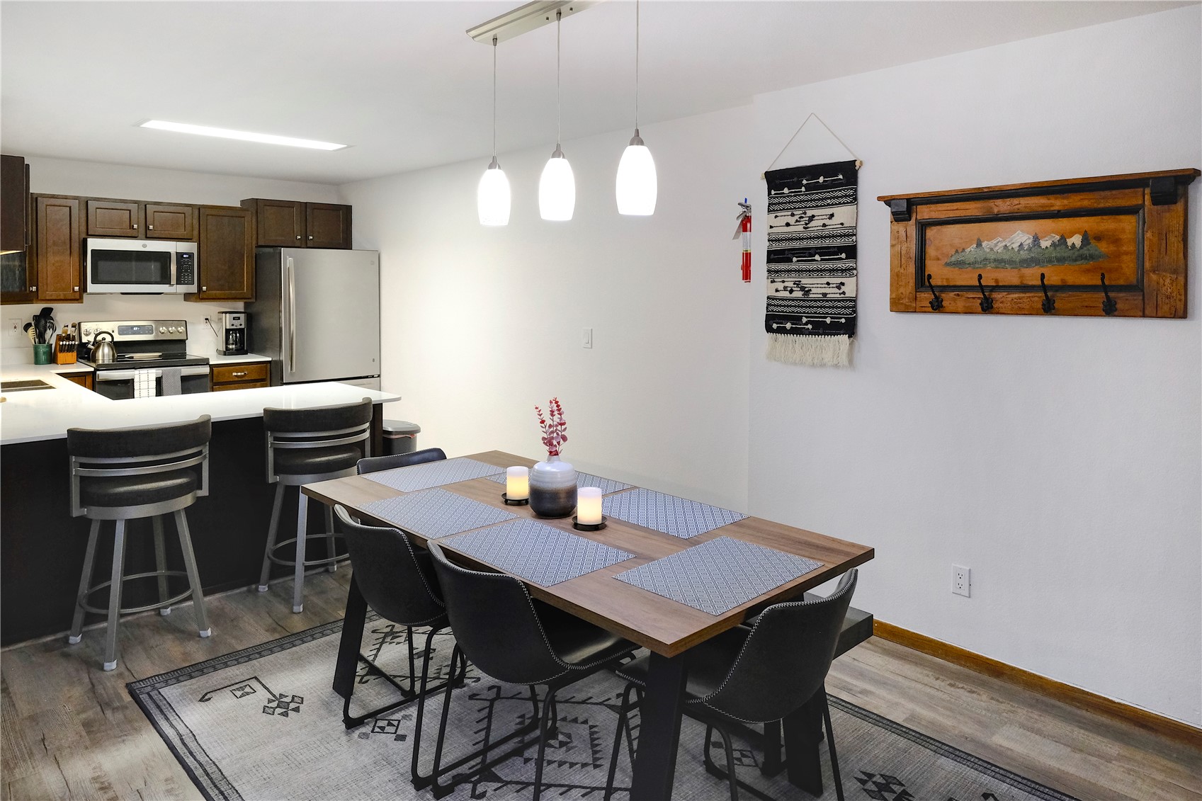 23034 Highway 6, Unit 305 Keystone, CO 80435 - Photo 9 of 27 a view of a dining room with furniture