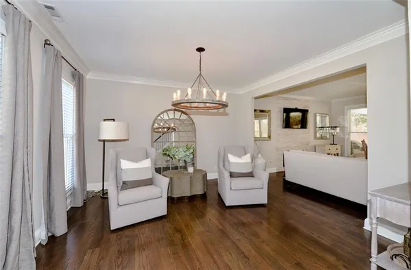 a view of a dining room with furniture and window