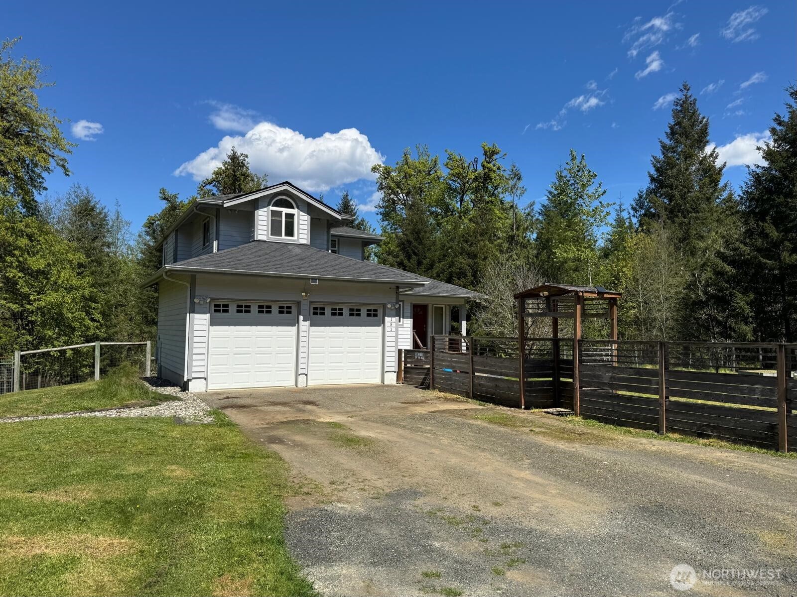 151 West Clark Road Shelton, WA 98584 - Photo 1 of 34 a front view of a house with a yard