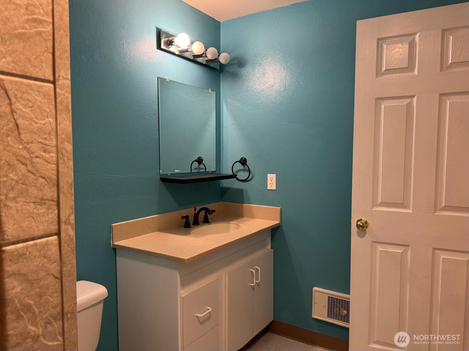 151 West Clark Road Shelton, WA 98584 - Photo 24 of 34 a bathroom with a sink and a mirror
