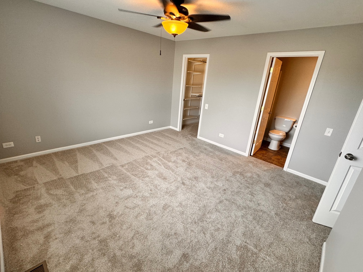 1617 Spaulding Road Bartlett, IL 60103 - Photo 6 of 10 a view of an empty room with a window