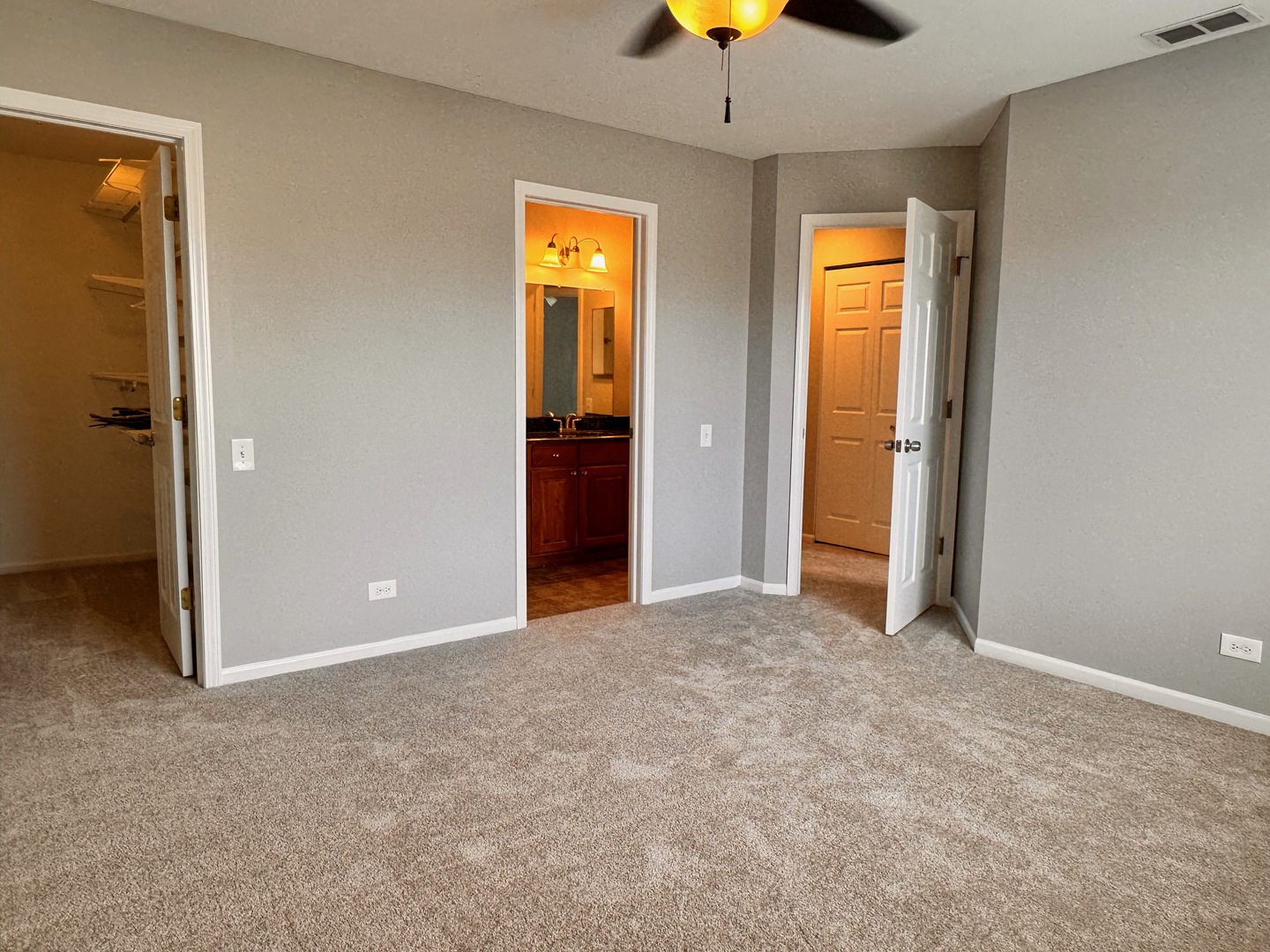 1617 Spaulding Road Bartlett, IL 60103 - Photo 7 of 10 an empty room with a window and chandelier