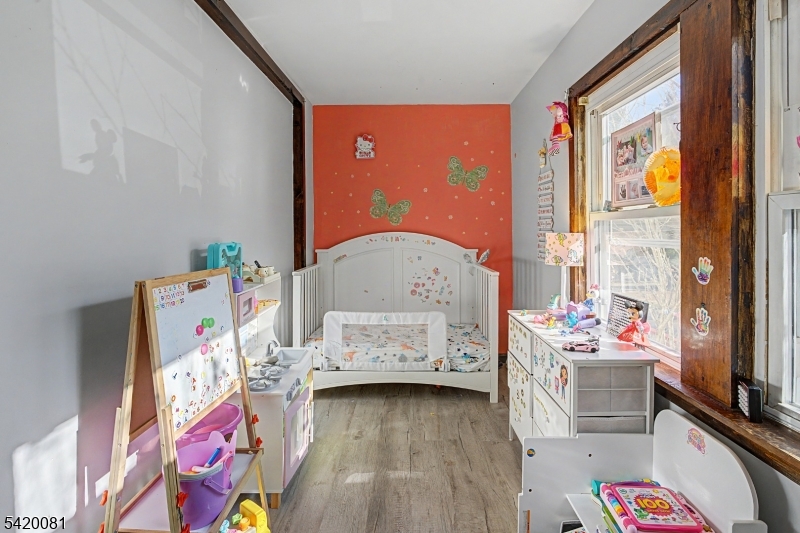 599 Berkshire Valley Road Wharton, NJ 07885 - Photo 12 of 20 a bedroom with furniture and a window
