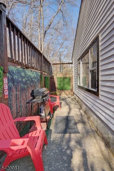 599 Berkshire Valley Road Wharton, NJ 07885 - Photo 16 of 20 a view of a porch with furniture and a yard