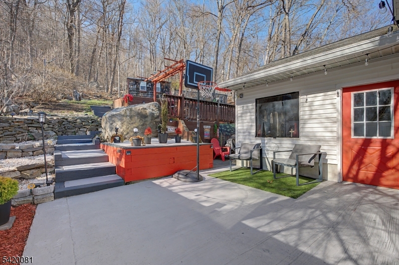 599 Berkshire Valley Road Wharton, NJ 07885 - Photo 17 of 20 a view of outdoor space yard deck patio and fire pit