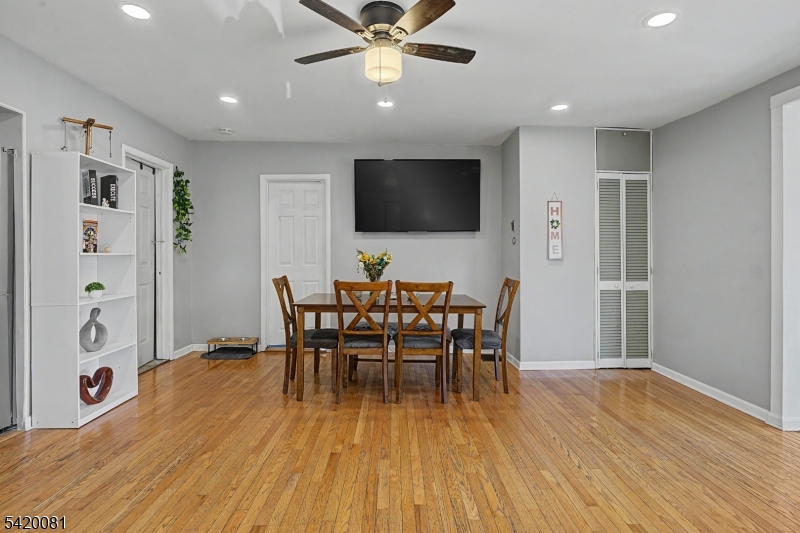 599 Berkshire Valley Road Wharton, NJ 07885 - Photo 7 of 20 a view of a dining room with furniture and wooden floor