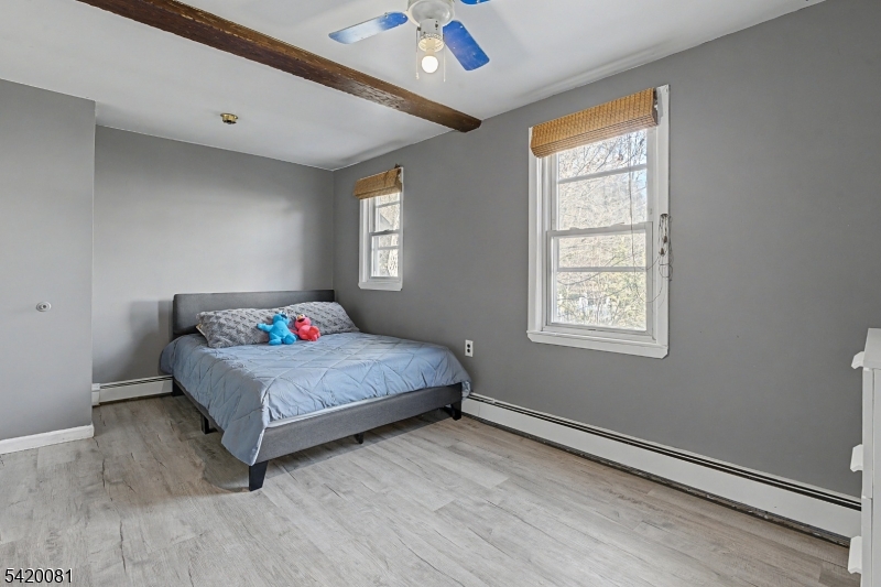 599 Berkshire Valley Road Wharton, NJ 07885 - Photo 8 of 20 a bedroom with bed and window