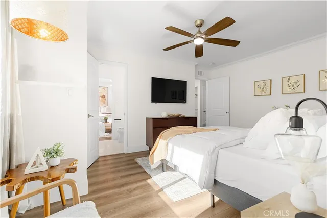 a view of a storage and utility room with washer and dryer