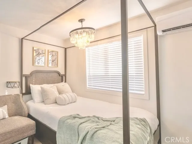 a kitchen with a table and chairs in it