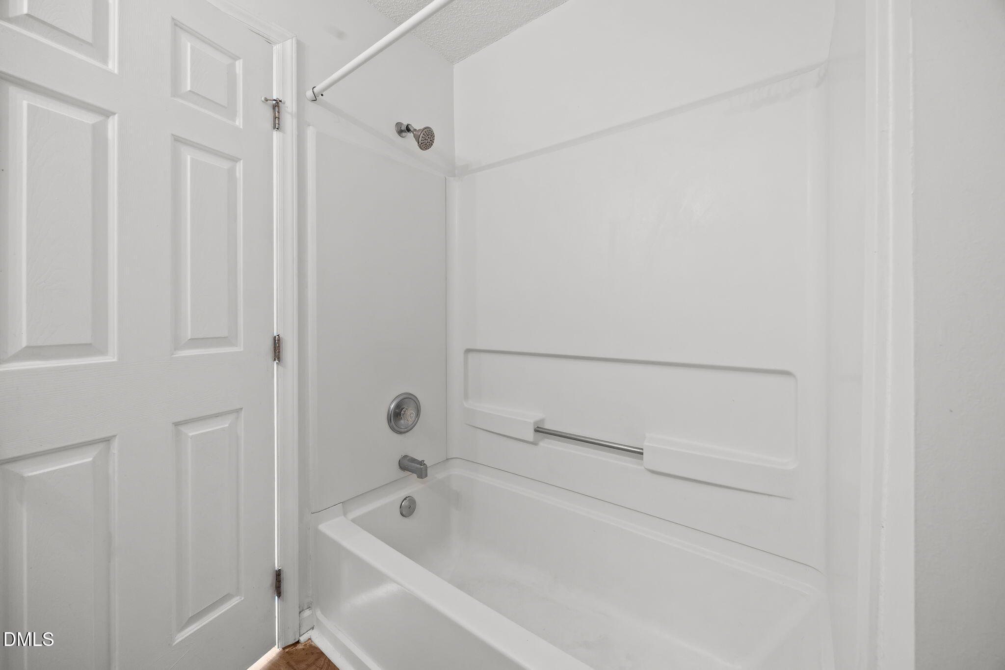 1303 Kent Road, Unit 204 Raleigh, NC 27606 - Photo 16 of 26 a bathroom with a tub
