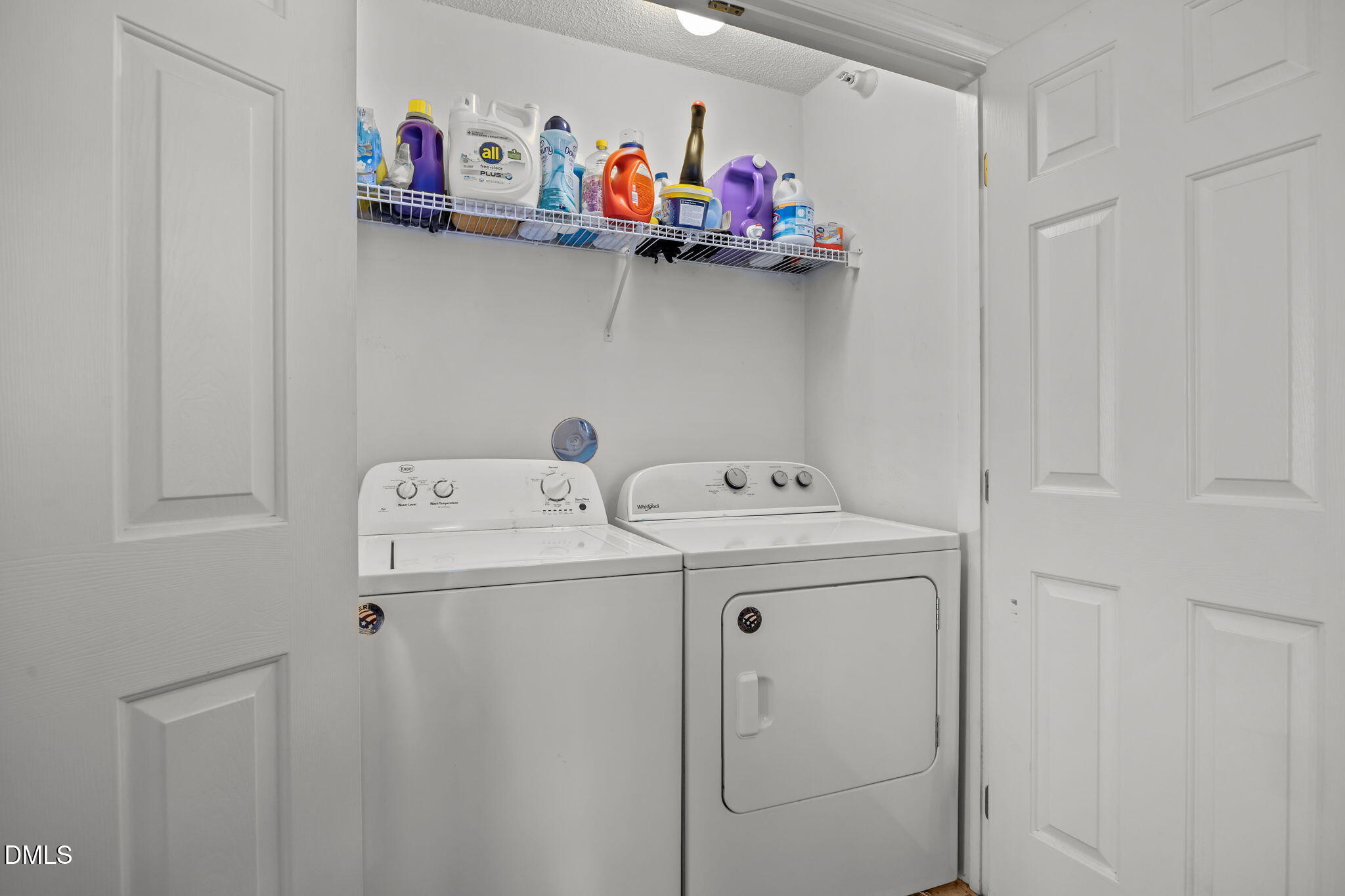 1303 Kent Road, Unit 204 Raleigh, NC 27606 - Photo 22 of 26 a utility room with dryer and washer