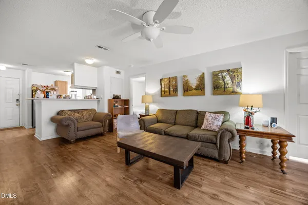 a living room with furniture and a couch