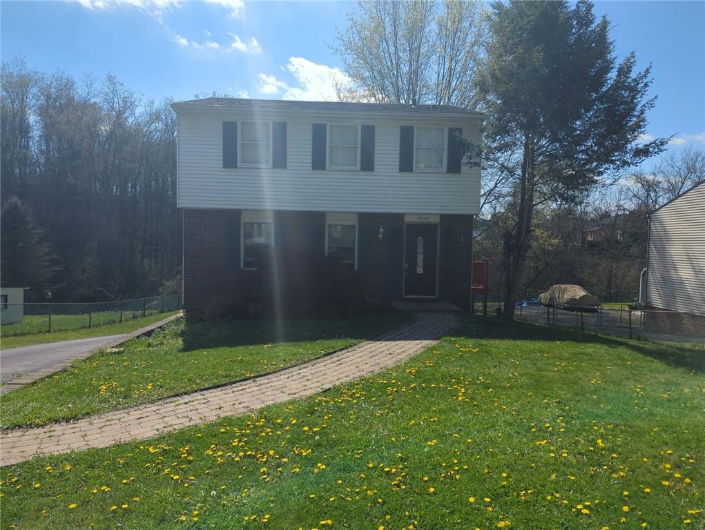 a view of a back yard of the house